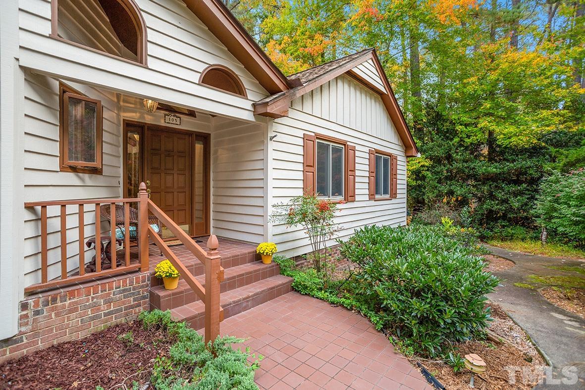 105 Carriage Trail Raleigh, NC 27614 - Photo 2 of 32 a view of a house with backyard and sitting area