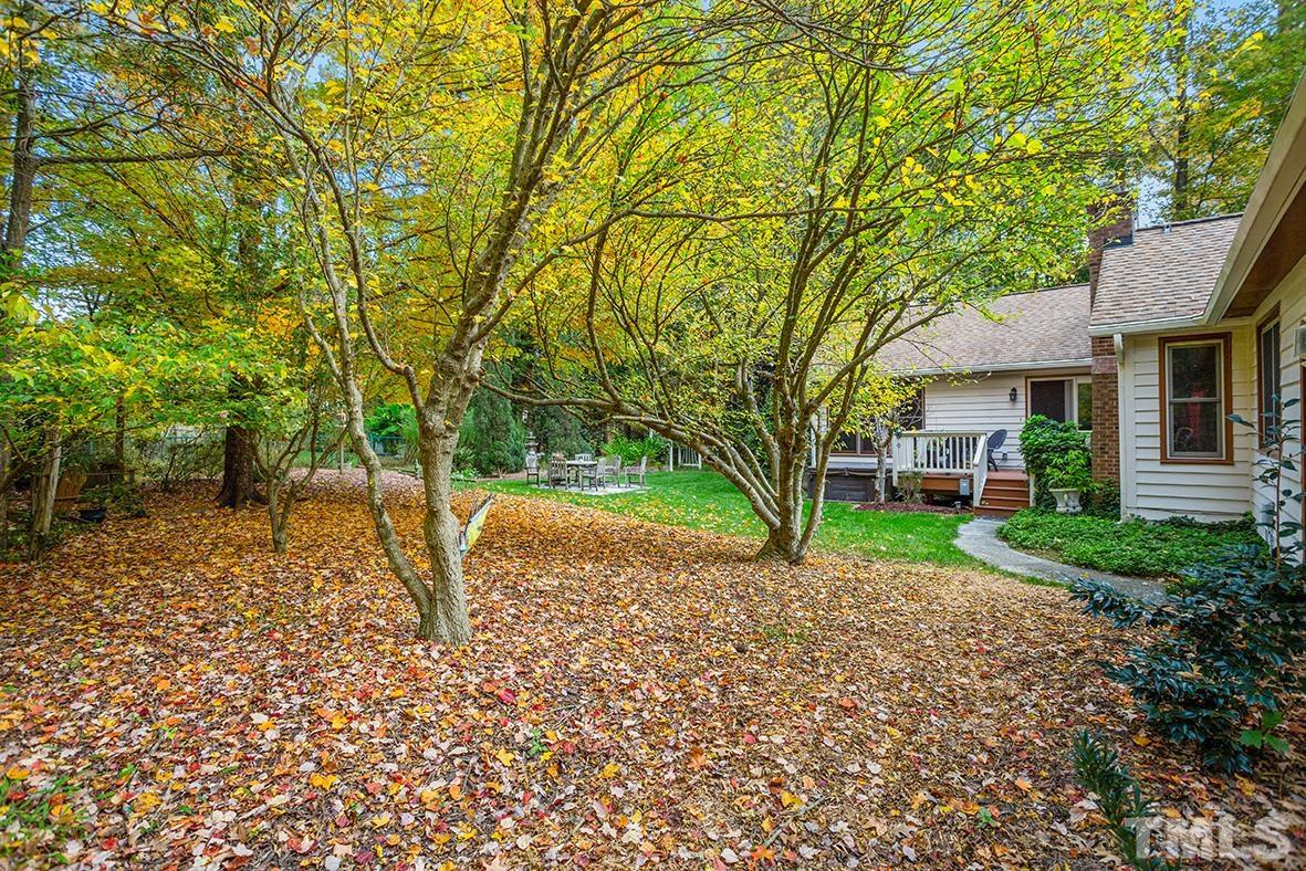 105 Carriage Trail Raleigh, NC 27614 - Photo 23 of 32 a house with trees in the background