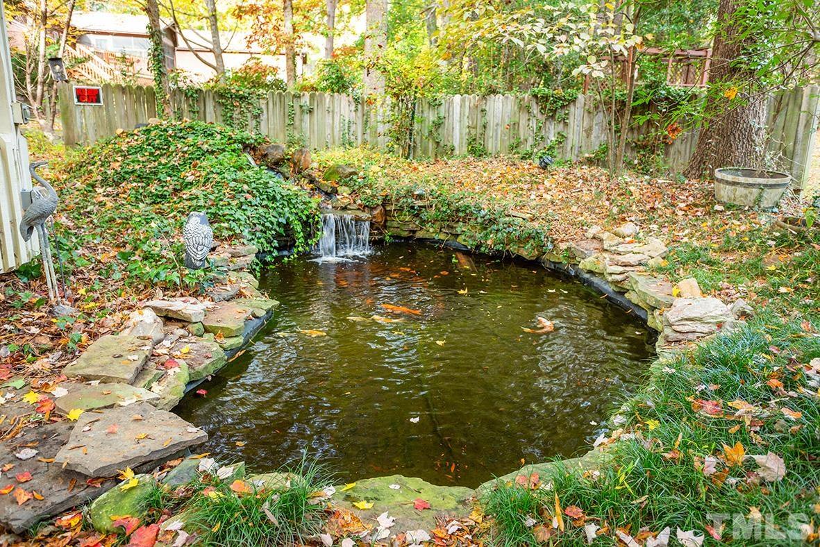 105 Carriage Trail Raleigh, NC 27614 - Photo 29 of 32 a view of backyard with swimming pool