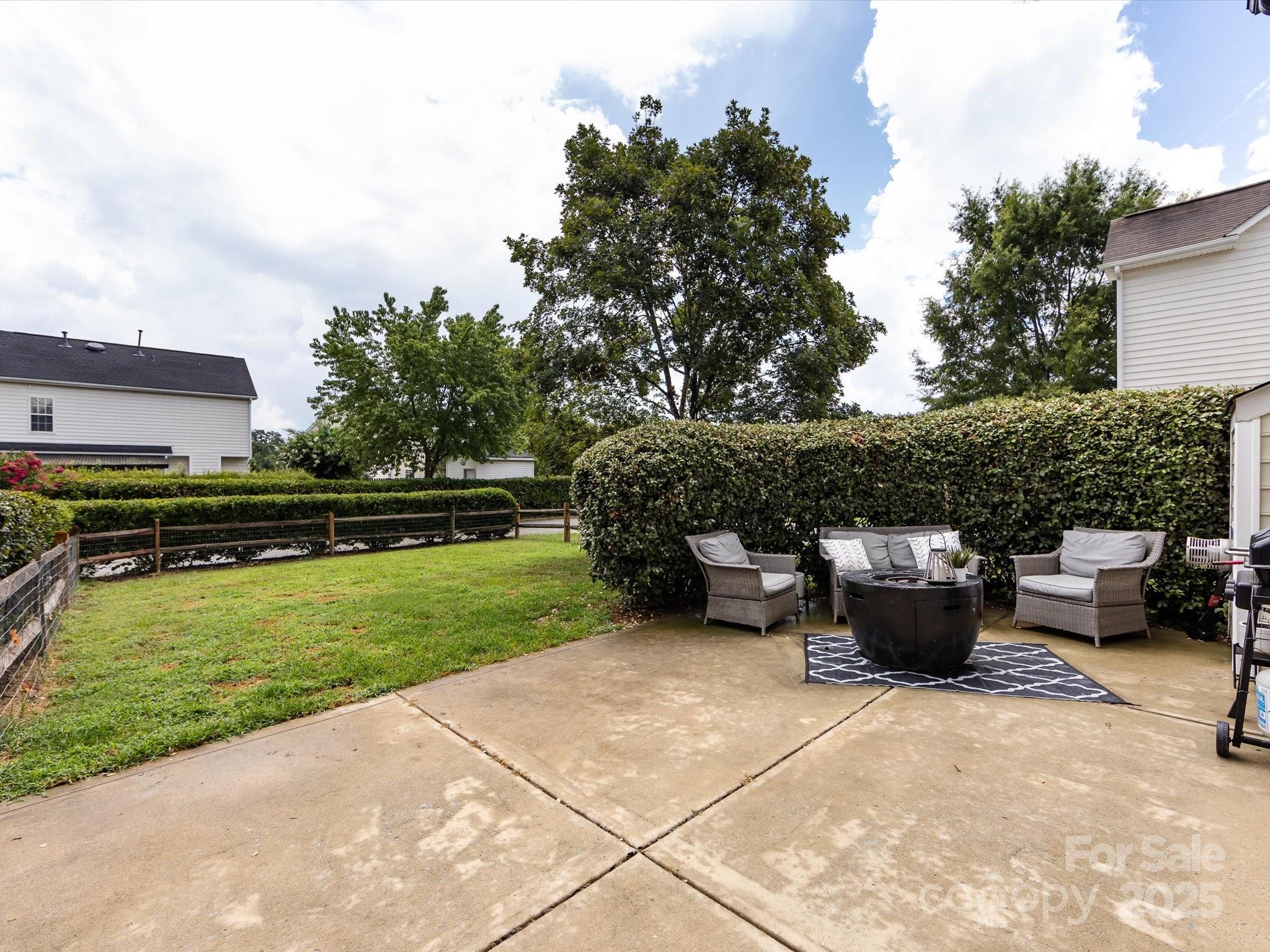 3910 Faith Church Road Indian Trail, NC 28079 - Photo 42 of 47 a view of a backyard with sitting area