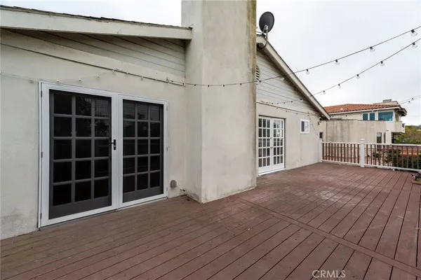 a view of a house with a large window
