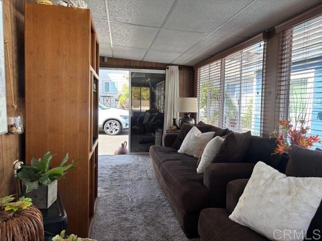 170 Diana Street, Unit 24 Encinitas, CA 92024 - Photo 11 of 26 a living room with furniture and a large window