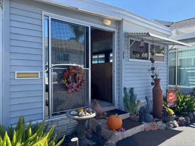 a view of a porch with outdoor seating