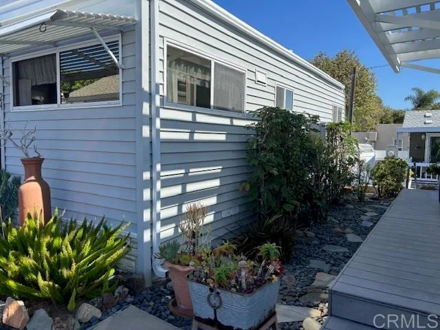 a view of a backyard with plants