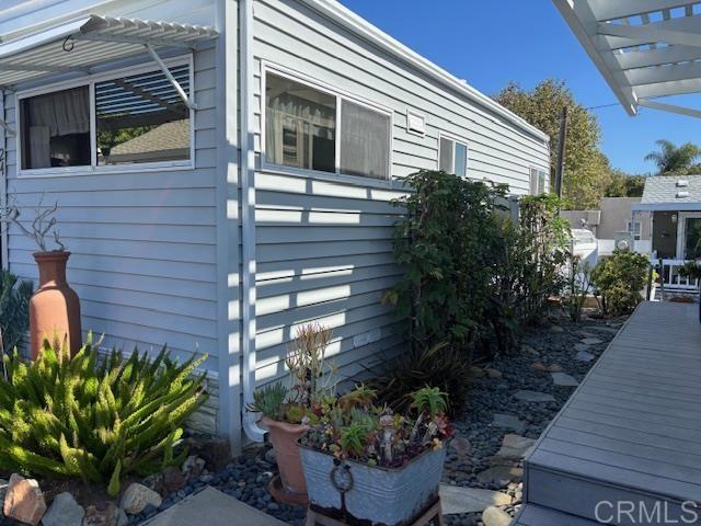 170 Diana Street, Unit 24 Encinitas, CA 92024 - Photo 6 of 26 a view of a backyard with plants