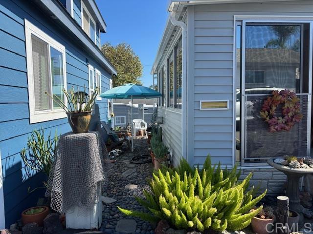 170 Diana Street, Unit 24 Encinitas, CA 92024 - Photo 7 of 26 a front view of a house with garden