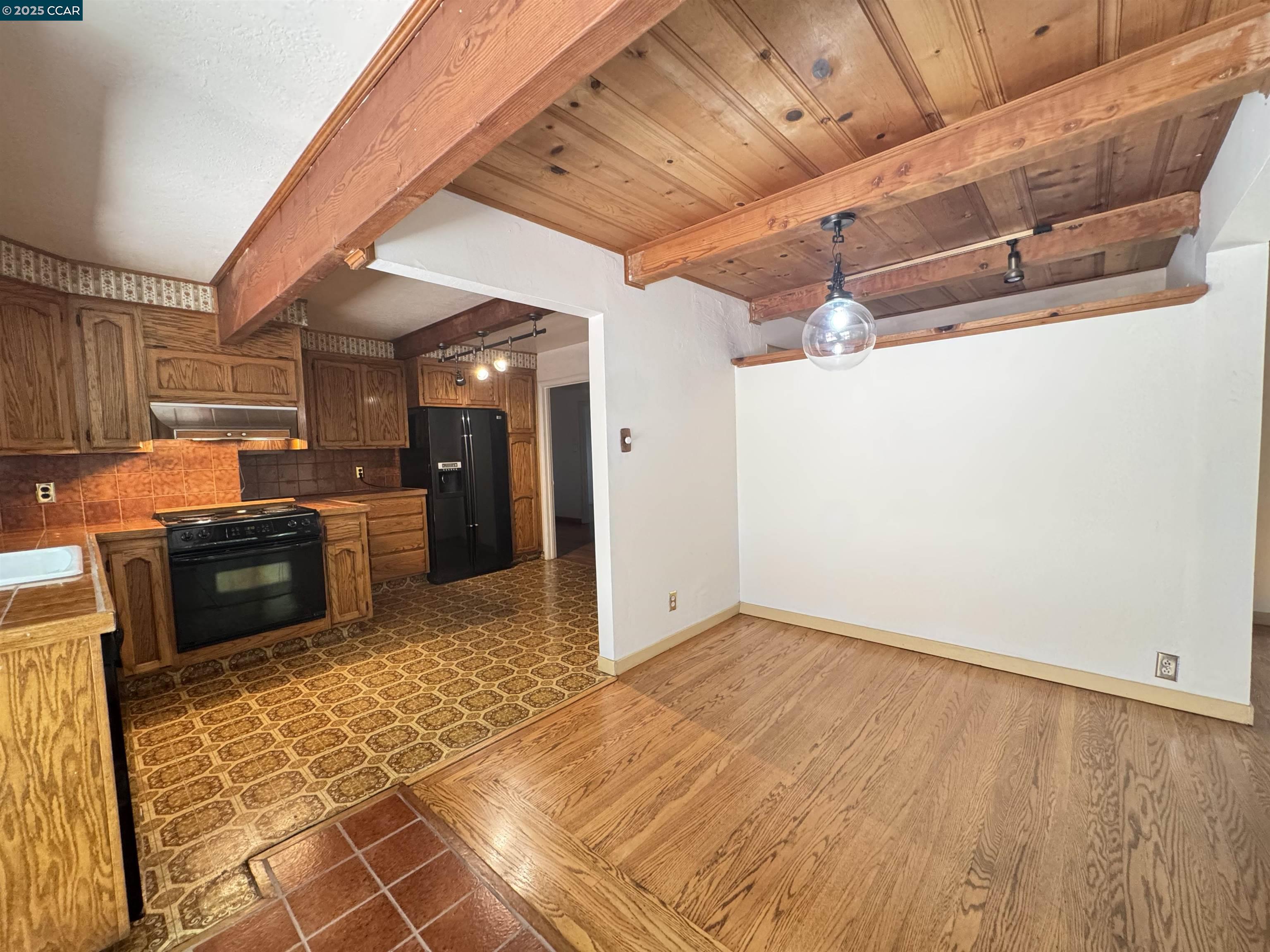 919 Janet Lane Lafayette, CA 94549 - Photo 7 of 29 a view of a kitchen with a sink and cabinets