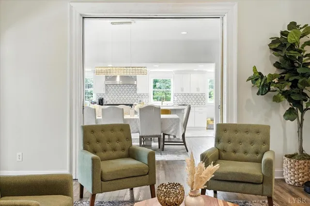 a kitchen with counter top space a sink cabinets and stainless steel appliances
