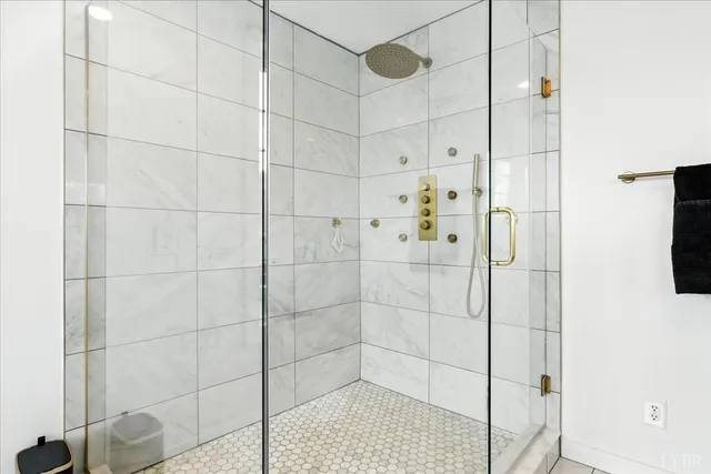 a living room with furniture fireplace and flat screen tv