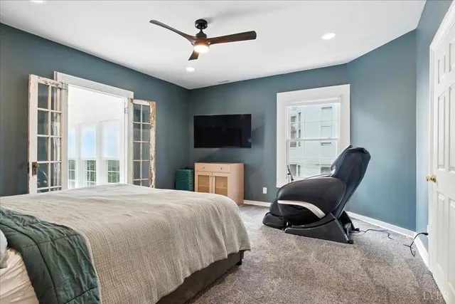 an aerial view of multiple houses with outdoor space