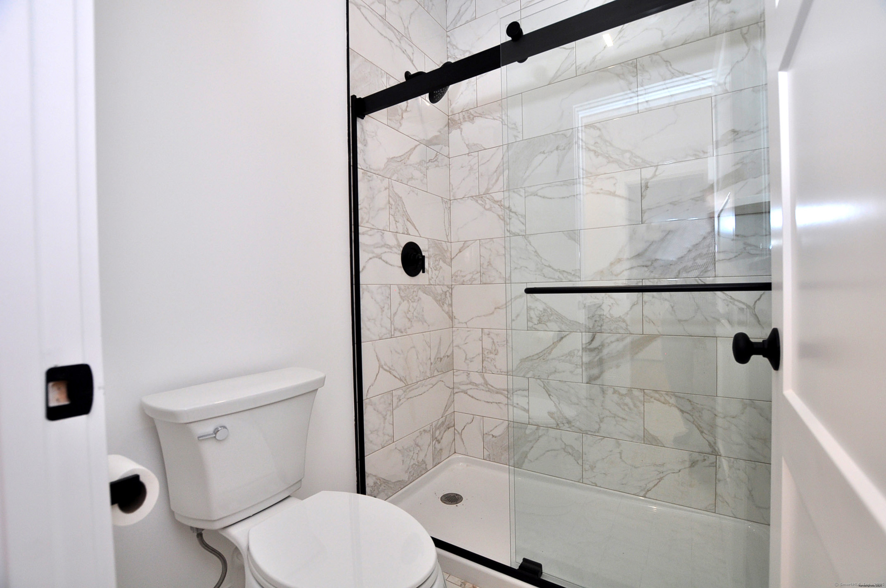 152 East Hill Road Canton, CT 06019 - Photo 14 of 36 a bathroom with a toilet and shower