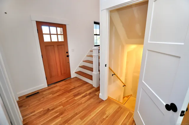 a spacious bedroom with a bed and a couch