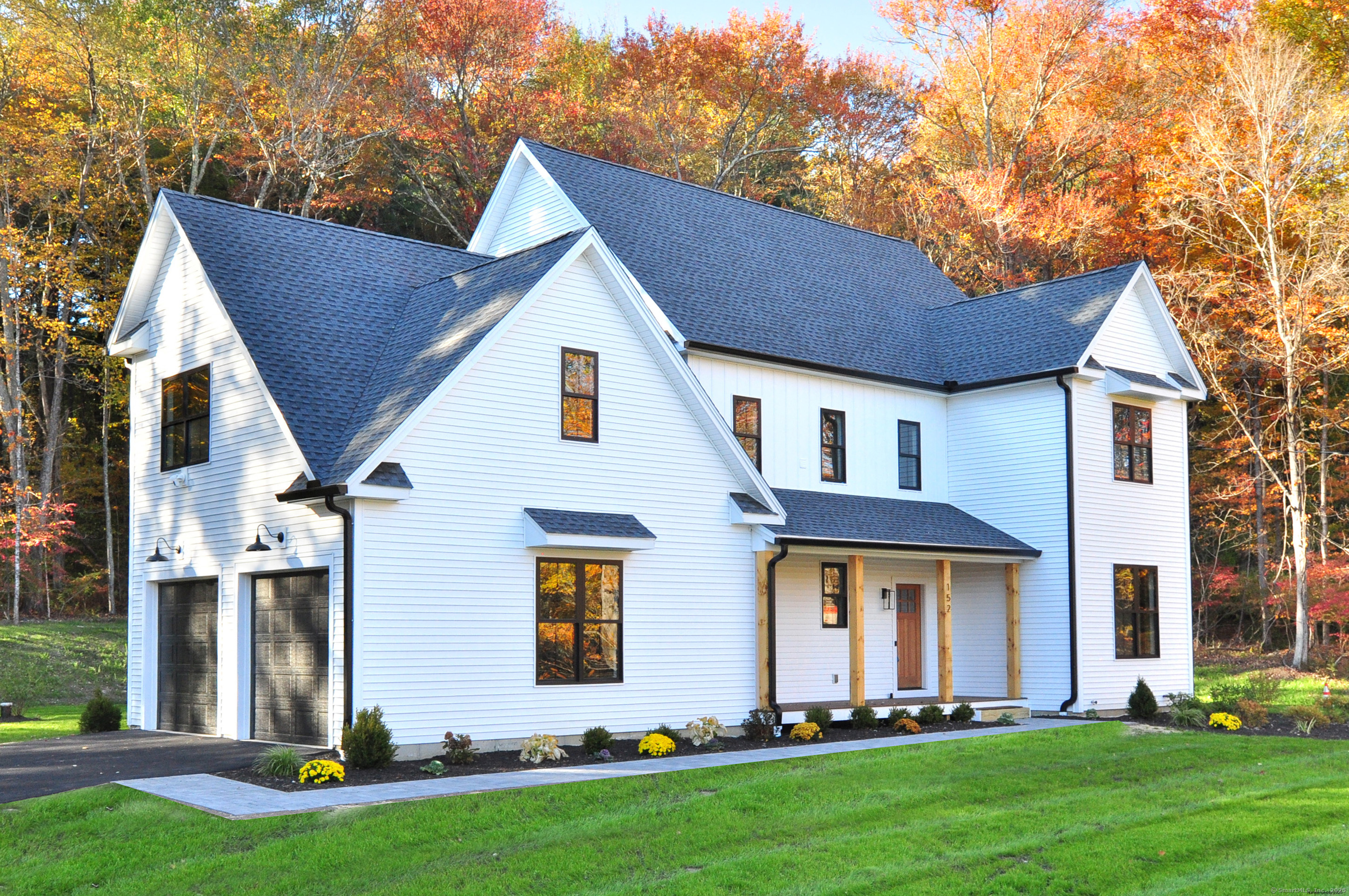 152 East Hill Road Canton, CT 06019 - Photo 20 of 36 a front view of house with yard and green space
