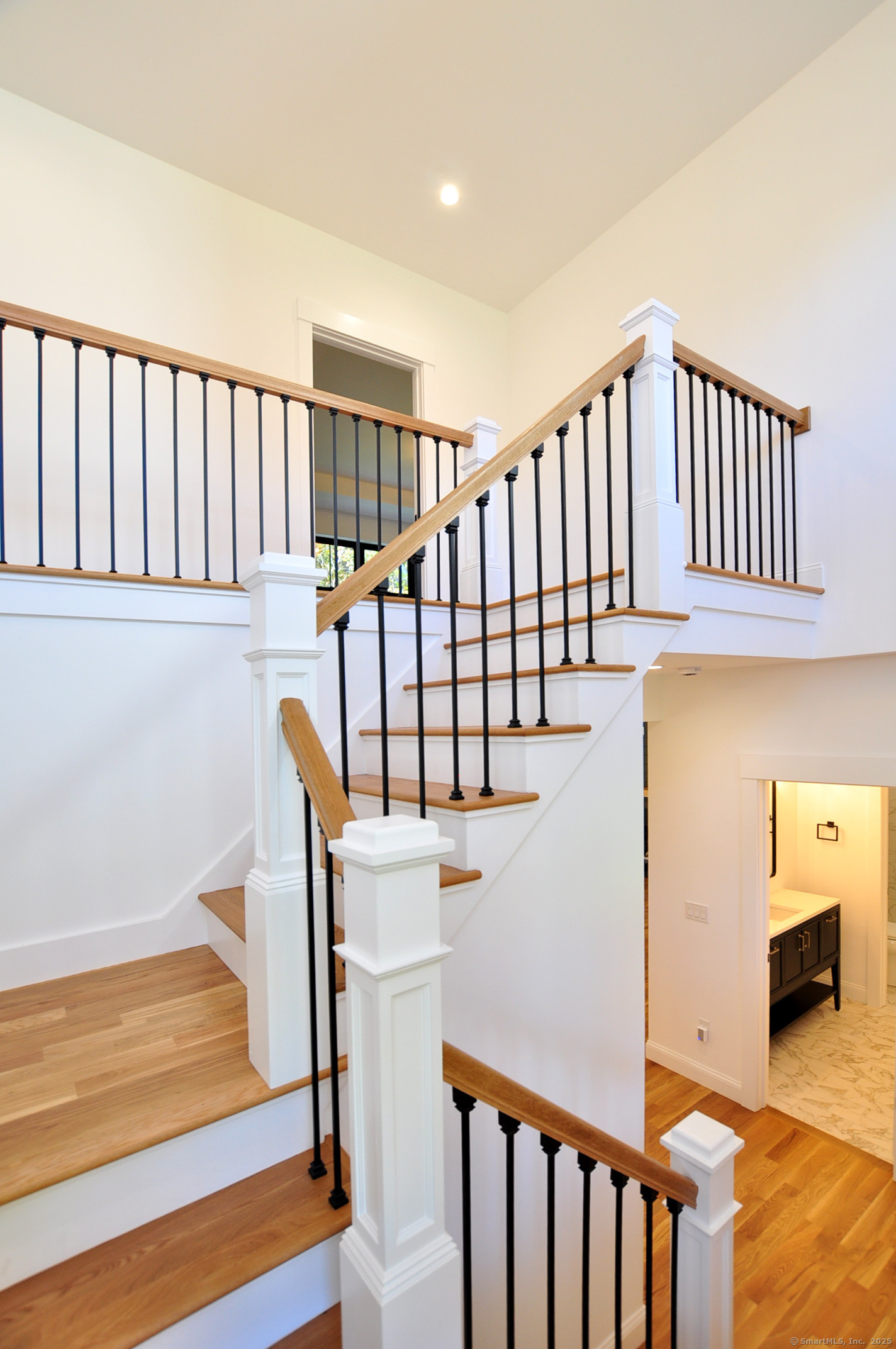 152 East Hill Road Canton, CT 06019 - Photo 3 of 36 a view of entryway with wooden floor and stairs