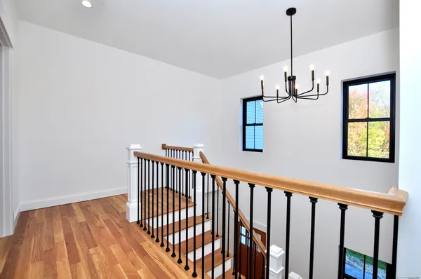 a view of hallway with windows