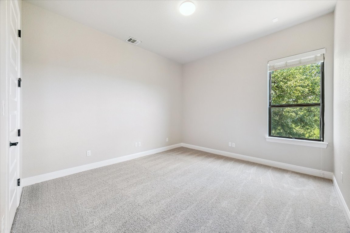 2113 Normandy View Leander, TX 78641 - Photo 16 of 23 an empty room with a window