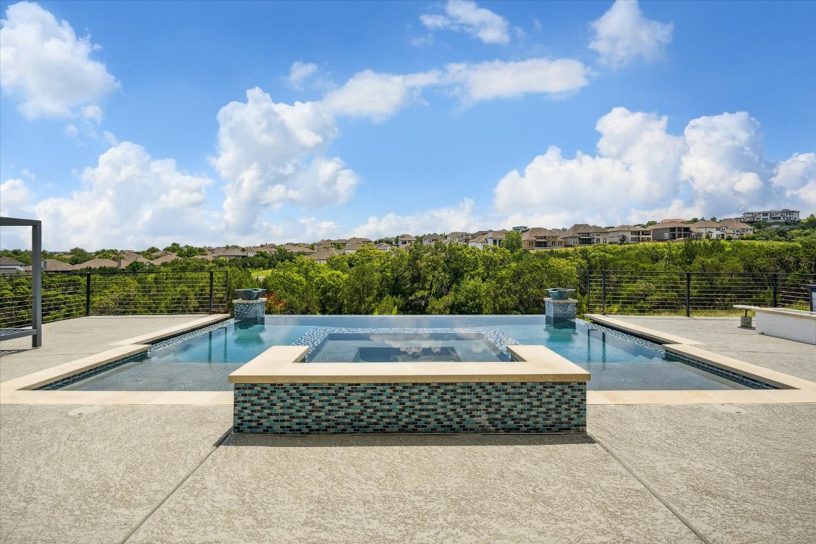 2113 Normandy View Leander, TX 78641 - Photo 21 of 23 a view of a swimming pool with a outdoor seating