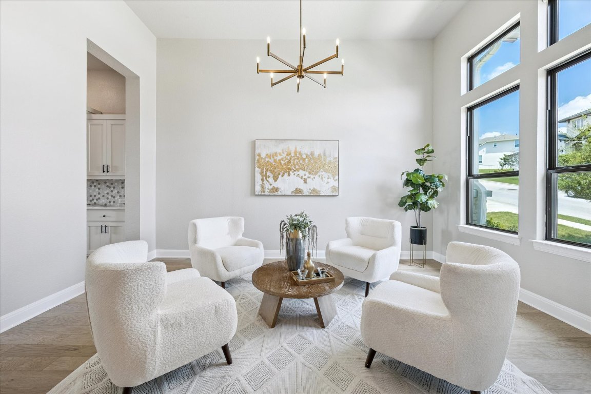 2113 Normandy View Leander, TX 78641 - Photo 3 of 23 a living room with furniture a rug and a window