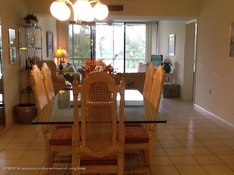 6157 Balboa Circle, Unit 206 Boca Raton, FL 33433 - Photo 13 of 31 a view of a dining room with furniture window and outside view