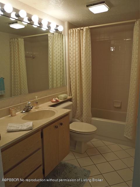 6157 Balboa Circle, Unit 206 Boca Raton, FL 33433 - Photo 14 of 31 a bathroom with a sink a toilet and shower