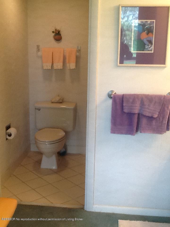 6157 Balboa Circle, Unit 206 Boca Raton, FL 33433 - Photo 20 of 31 a bathroom with a toilet and a sink