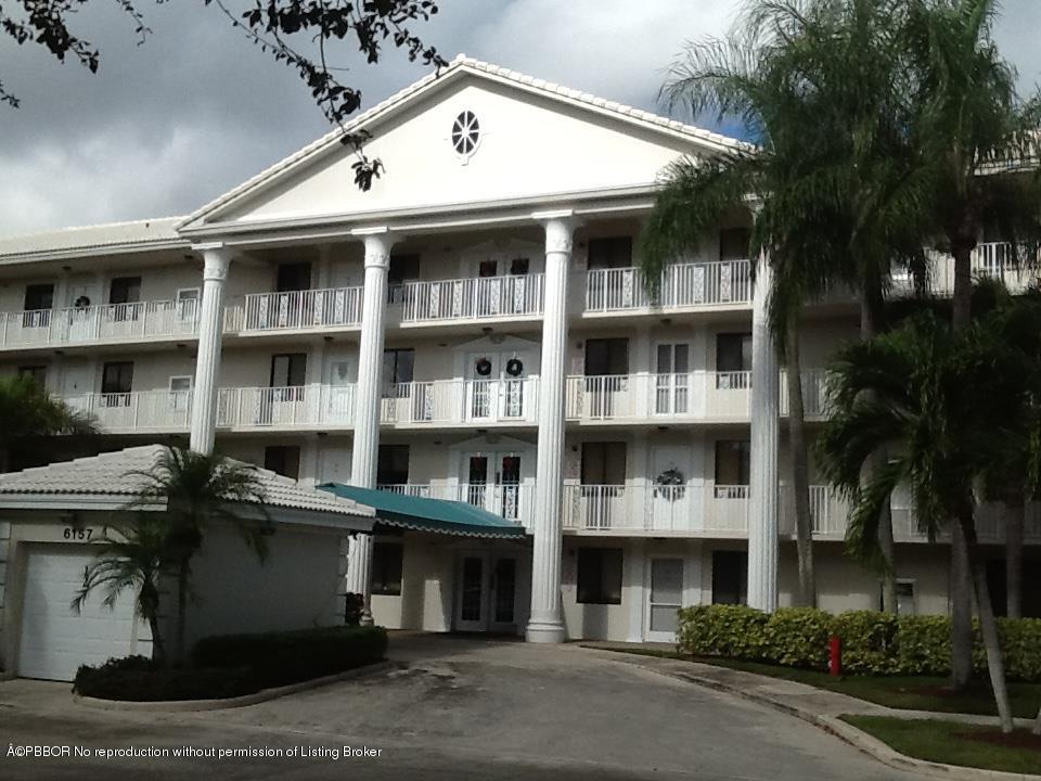 6157 Balboa Circle, Unit 206 Boca Raton, FL 33433 - Photo 31 of 31 a front view of multi story residential apartment building