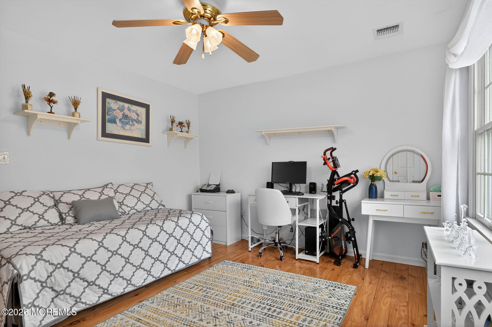 520 Hardenberg Avenue Point Pleasant, NJ 08742 - Photo 18 of 36 a bedroom with furniture and a wooden floor