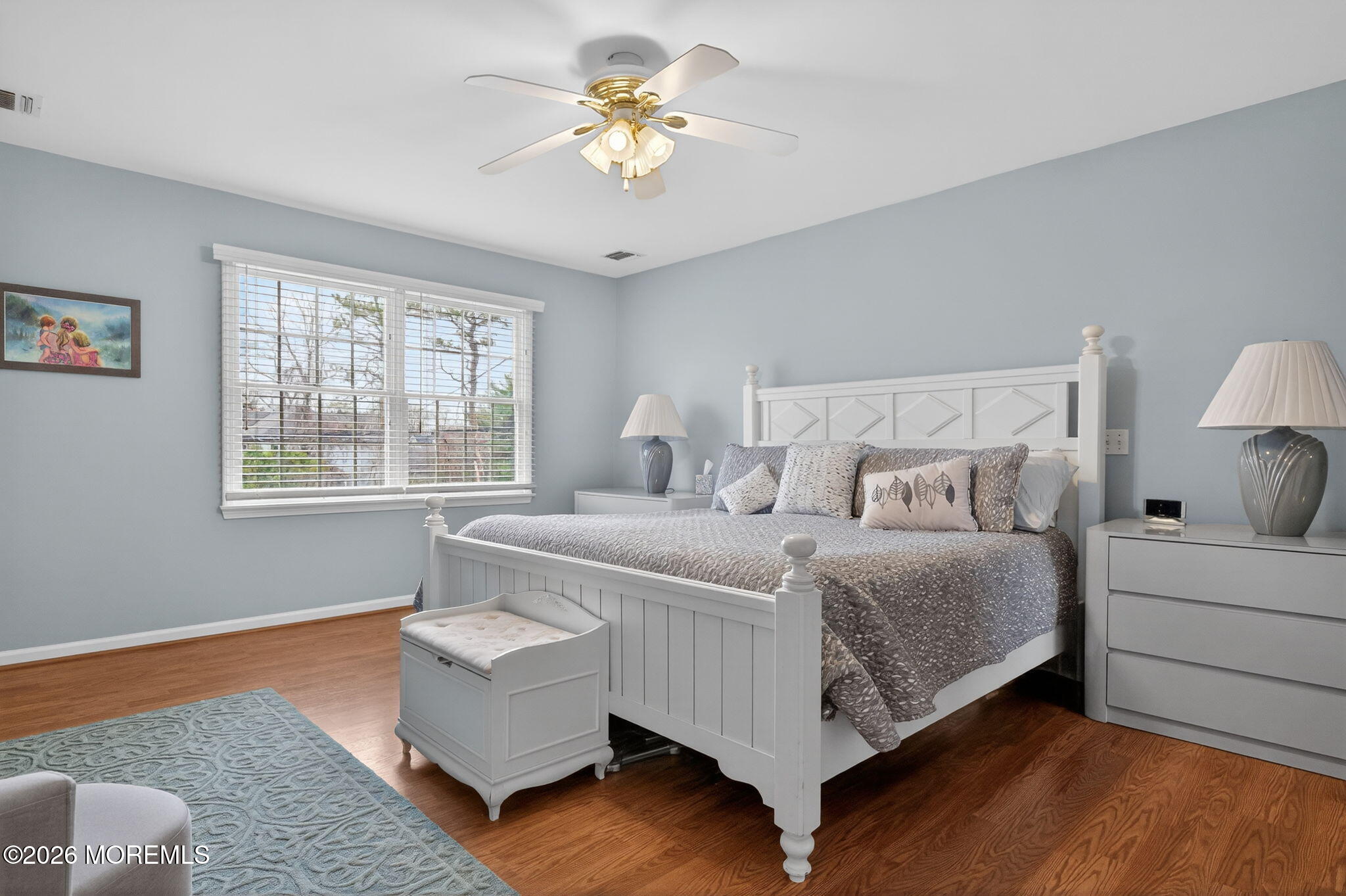 520 Hardenberg Avenue Point Pleasant, NJ 08742 - Photo 21 of 36 a bedroom with a bed chandelier and a window