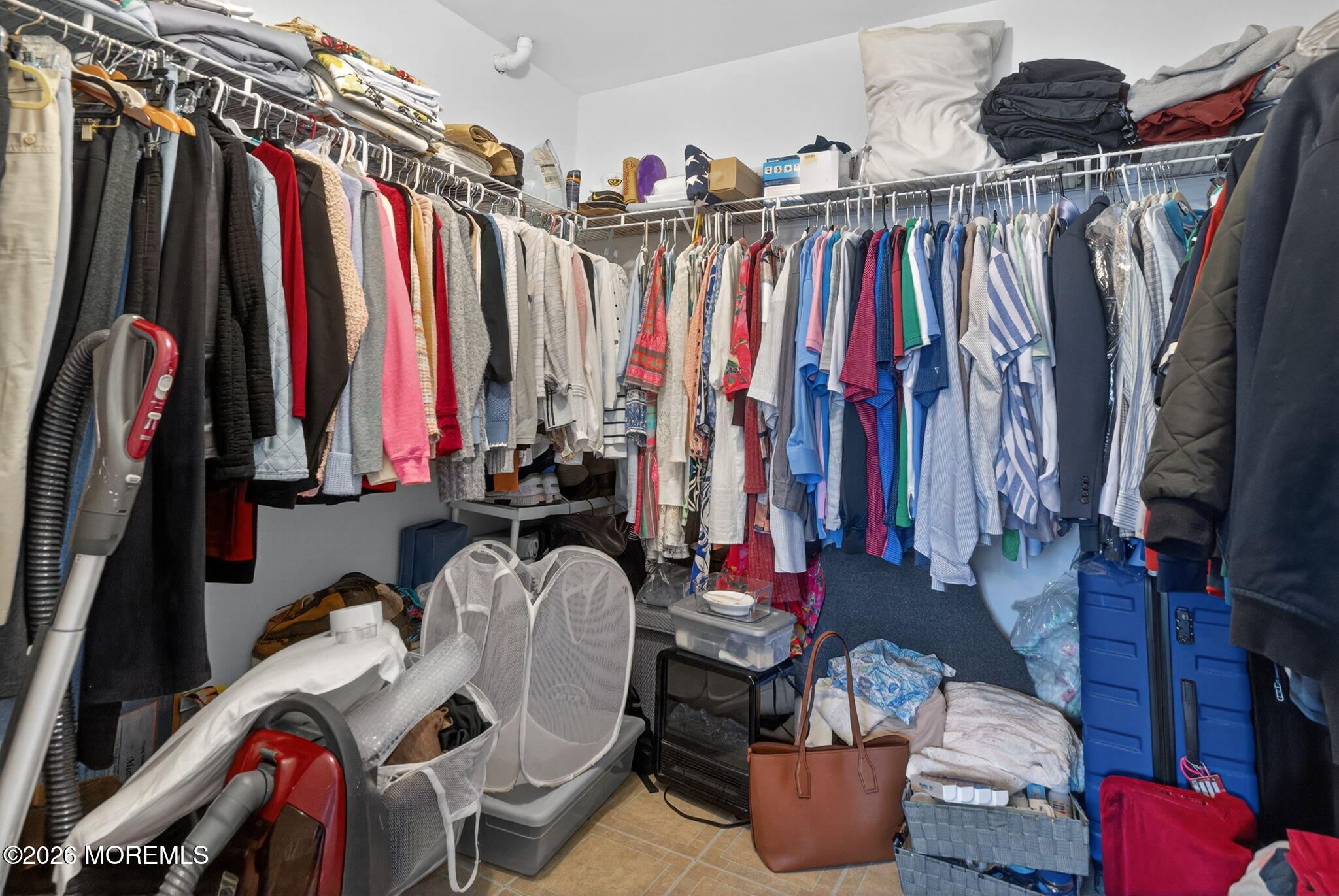 520 Hardenberg Avenue Point Pleasant, NJ 08742 - Photo 24 of 36 a view of walk in closet with clothes and shoes