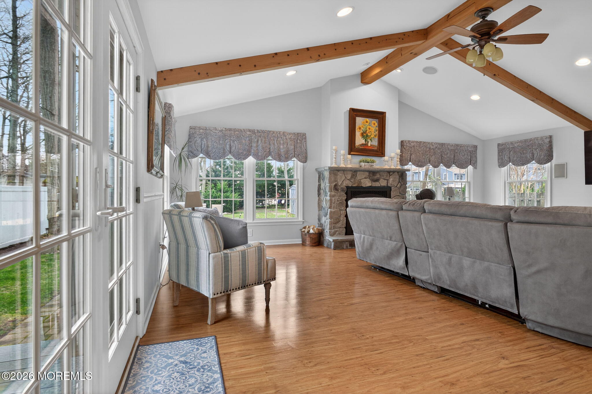 520 Hardenberg Avenue Point Pleasant, NJ 08742 - Photo 25 of 36 a living room with furniture and a fireplace