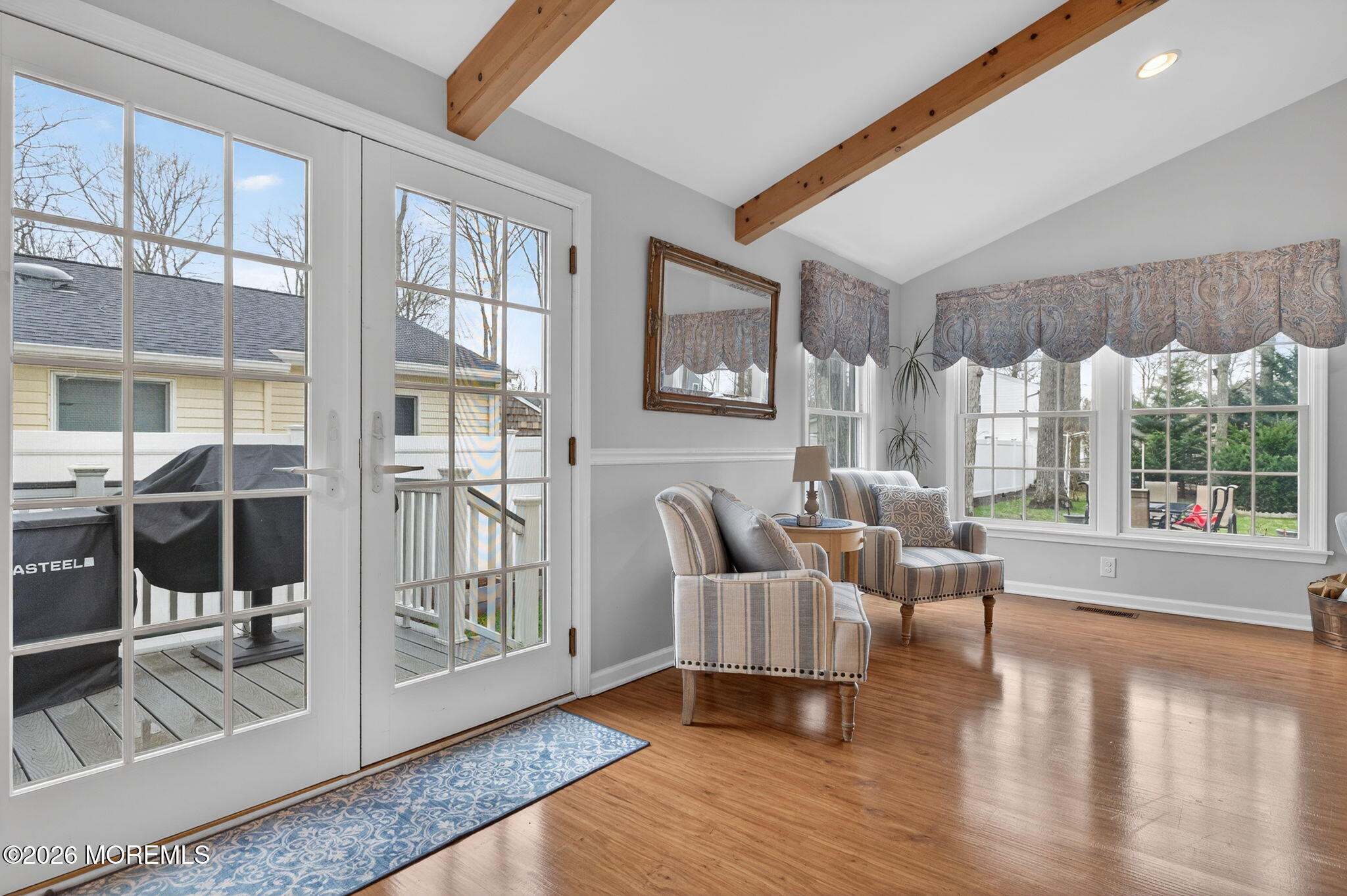520 Hardenberg Avenue Point Pleasant, NJ 08742 - Photo 27 of 36 a living room with furniture and a floor to ceiling window