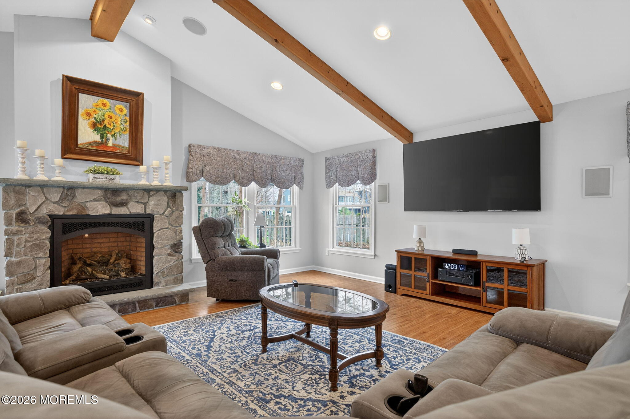 520 Hardenberg Avenue Point Pleasant, NJ 08742 - Photo 28 of 36 a living room with furniture and a flat screen tv