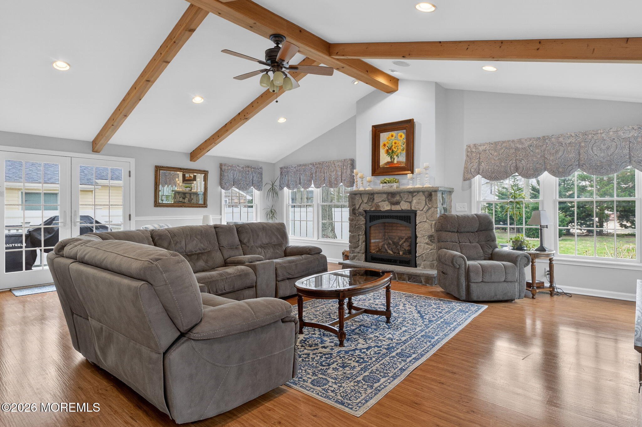 520 Hardenberg Avenue Point Pleasant, NJ 08742 - Photo 29 of 36 a living room with furniture and a fireplace