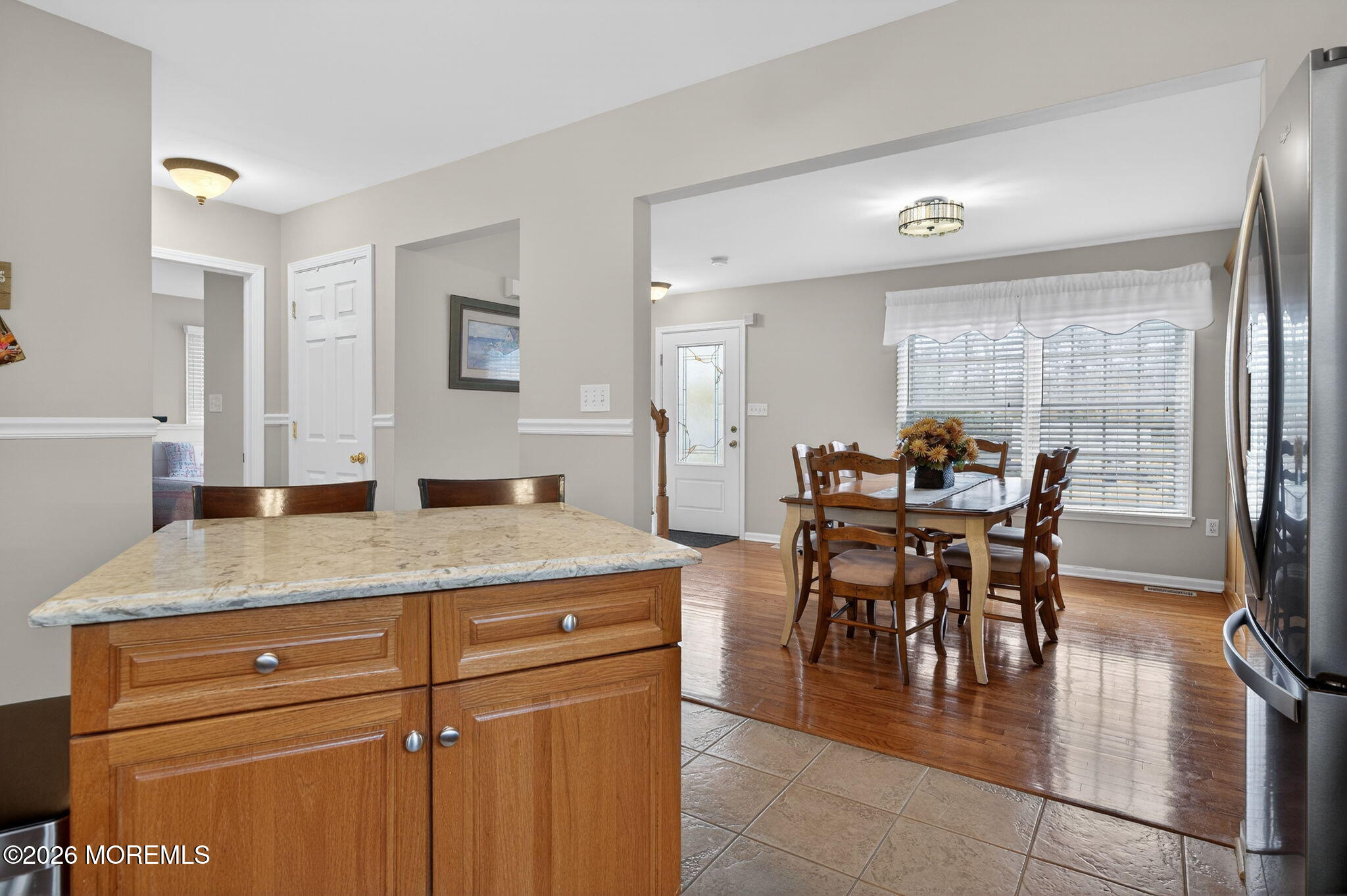 520 Hardenberg Avenue Point Pleasant, NJ 08742 - Photo 6 of 36 a kitchen with a table and chairs in it