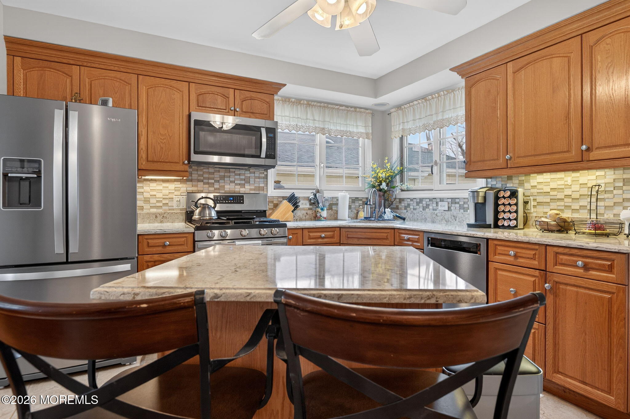 520 Hardenberg Avenue Point Pleasant, NJ 08742 - Photo 7 of 36 a kitchen with a stove a sink and a refrigerator