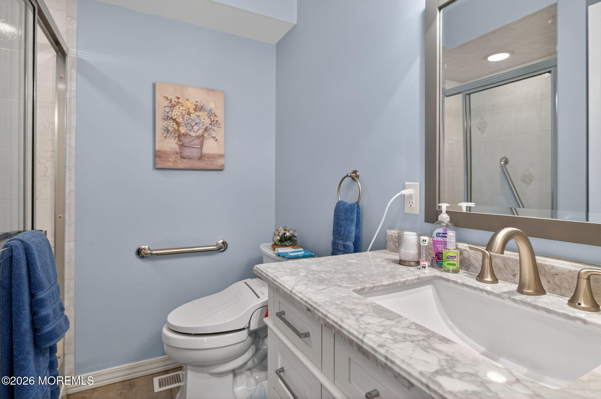 520 Hardenberg Avenue Point Pleasant, NJ 08742 - Photo 8 of 36 a bathroom with a granite countertop toilet sink and mirror