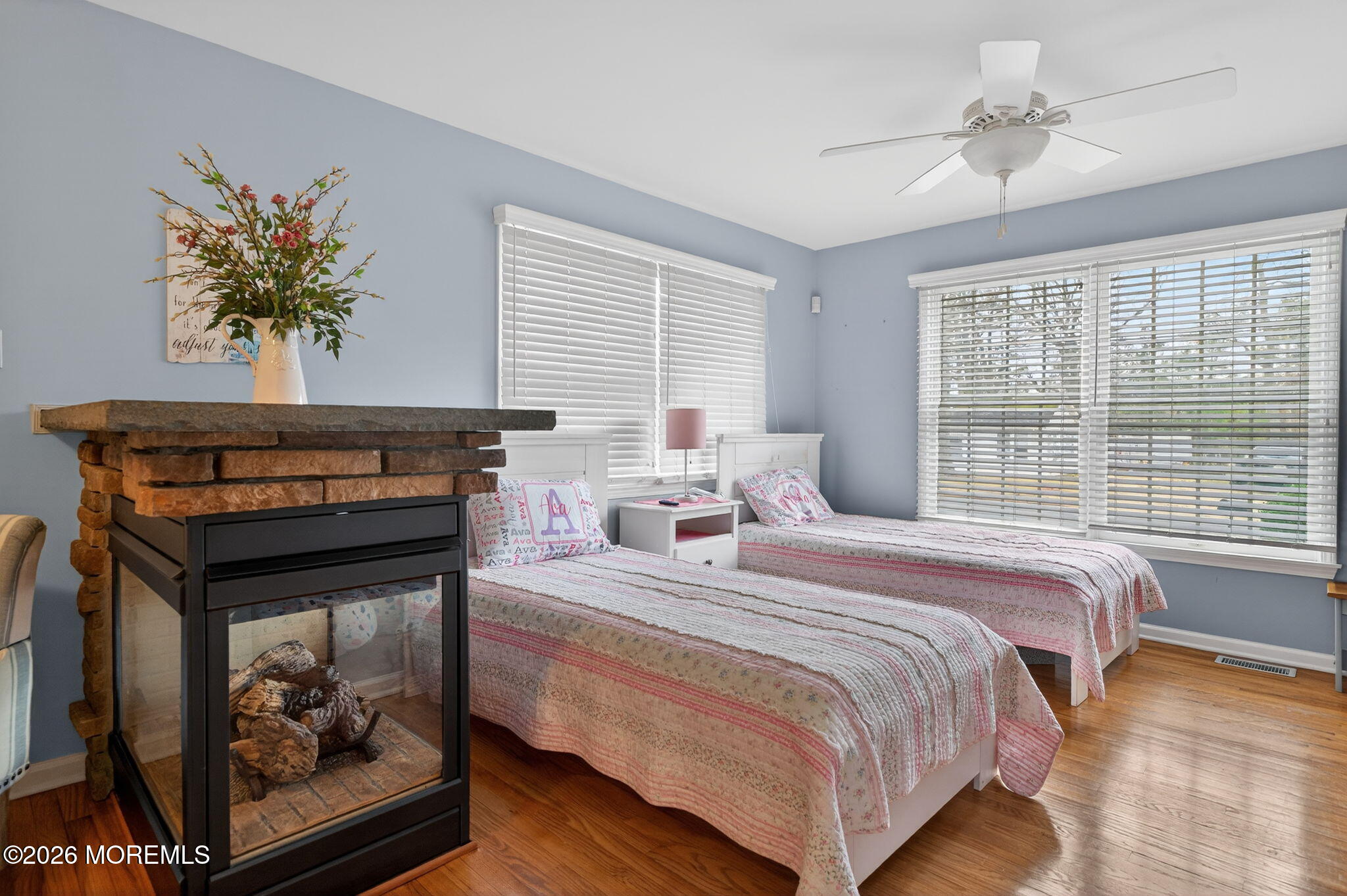 520 Hardenberg Avenue Point Pleasant, NJ 08742 - Photo 9 of 36 a bedroom with a bed a window and painting on the wall