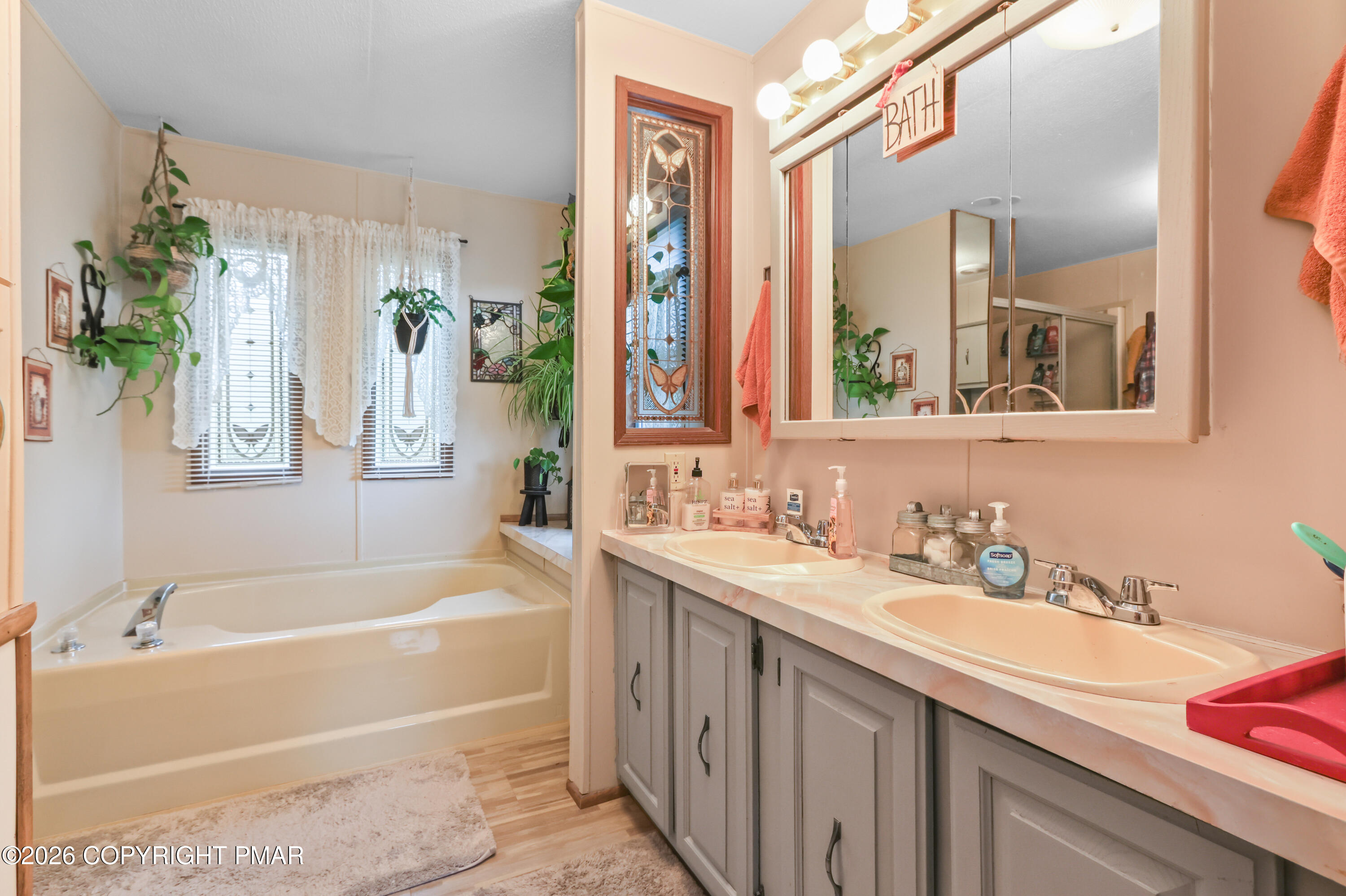 17 Valley View Drive Bath, PA 18014 - Photo 17 of 34 a bathroom with a tub sink and mirror