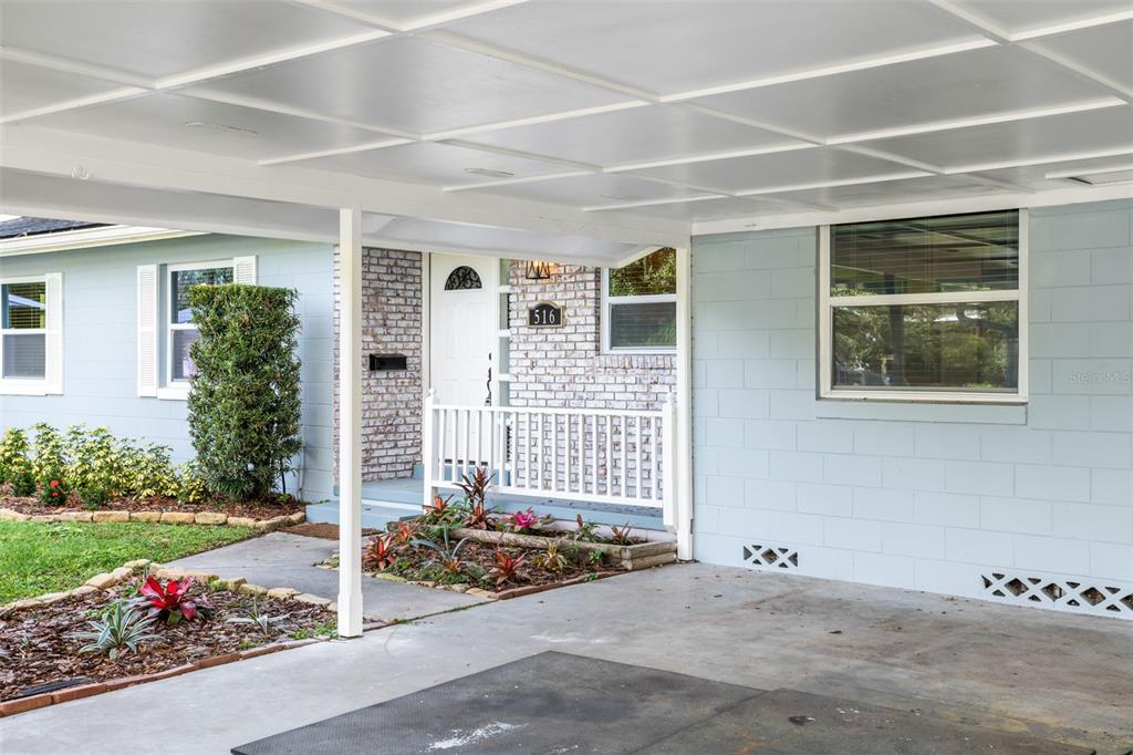 516 Baxter Street Orlando, FL 32806 - Photo 5 of 40 a front view of a house with a yard