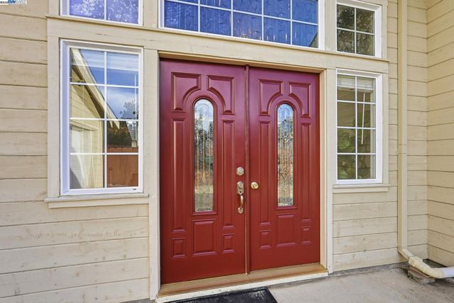 a front view of a house with a entryway