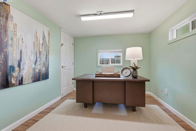 a room with furniture and a window