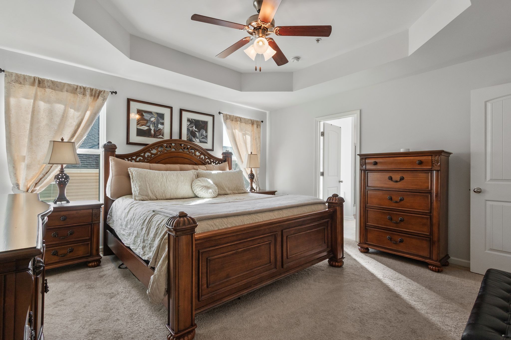 1002 Muna Court Spring Hill, TN 37174 - Photo 18 of 28 a bedroom with a bed and a dresser