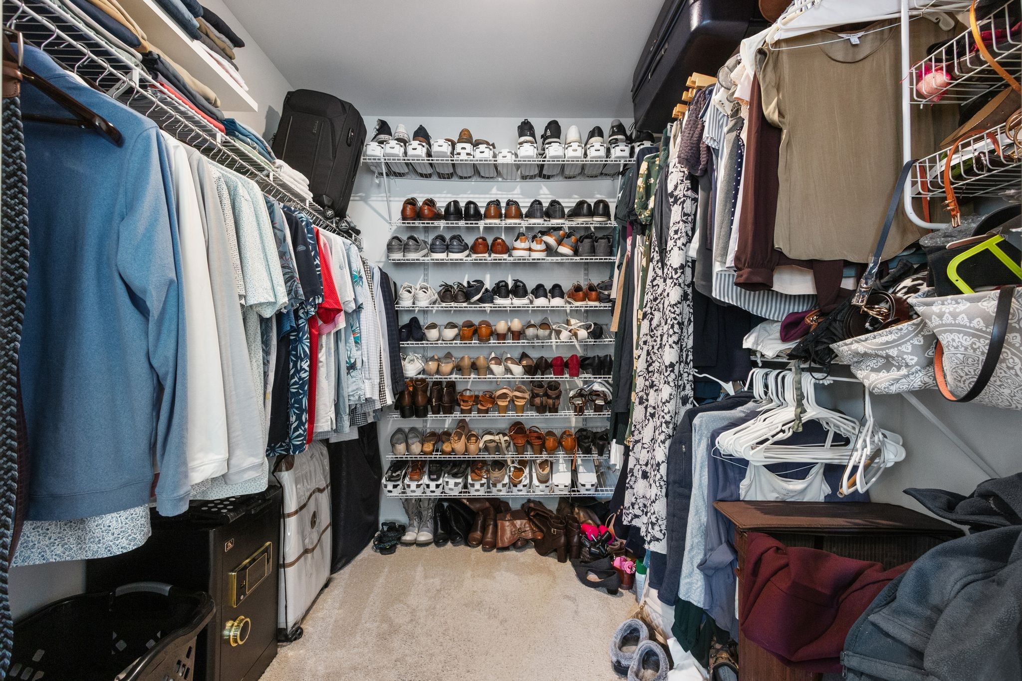 1002 Muna Court Spring Hill, TN 37174 - Photo 23 of 28 a view of walk in closet with clothes and shoes