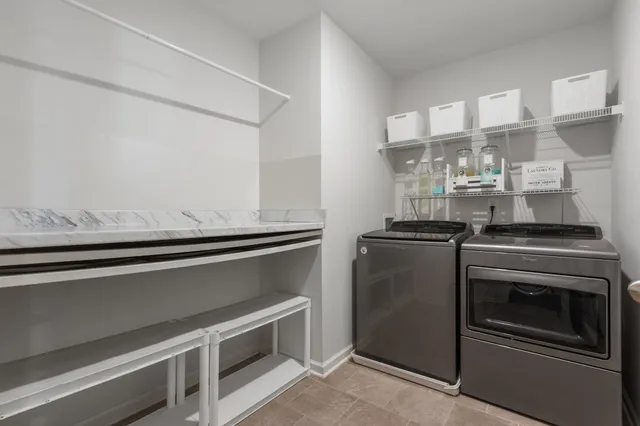 a close view of stove top oven and cabinets