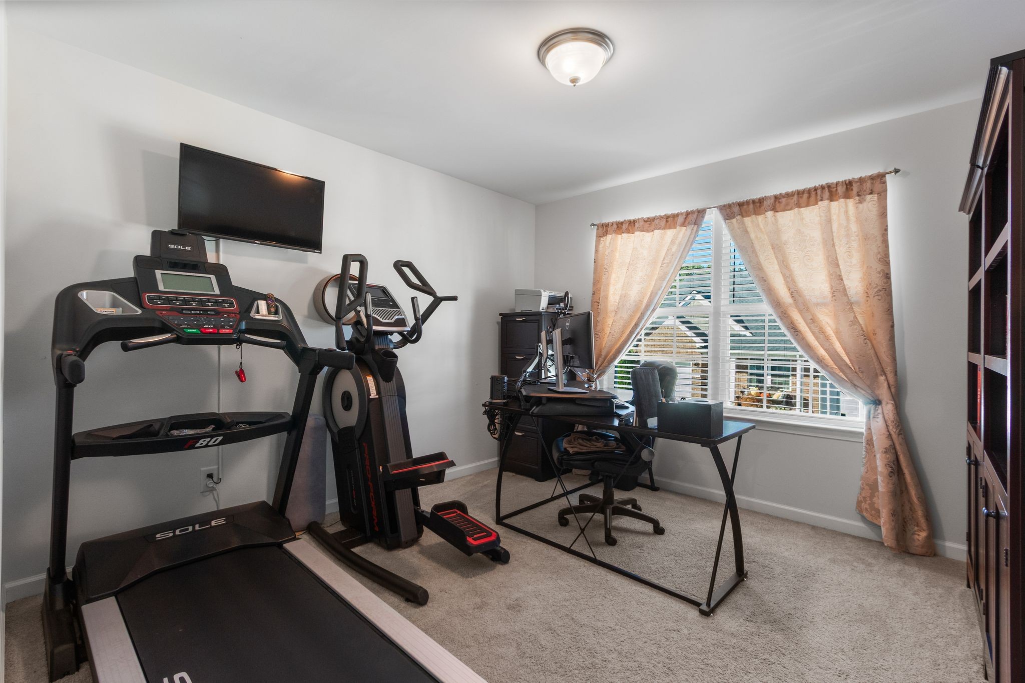 1002 Muna Court Spring Hill, TN 37174 - Photo 25 of 28 a view of a room with gym equipment