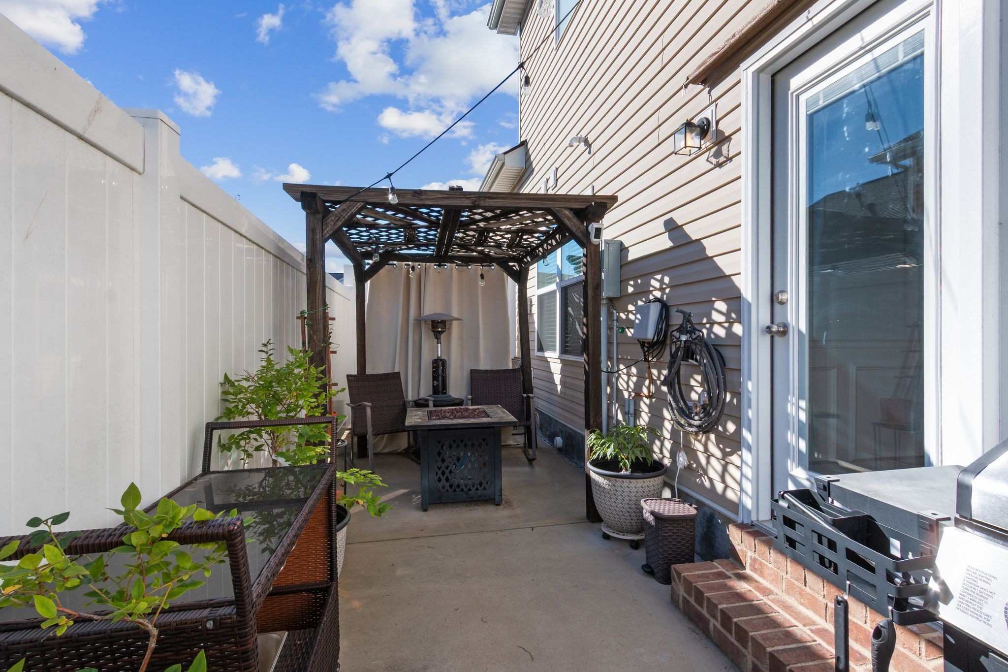 1002 Muna Court Spring Hill, TN 37174 - Photo 28 of 28 a view of a chairs and table in a patio