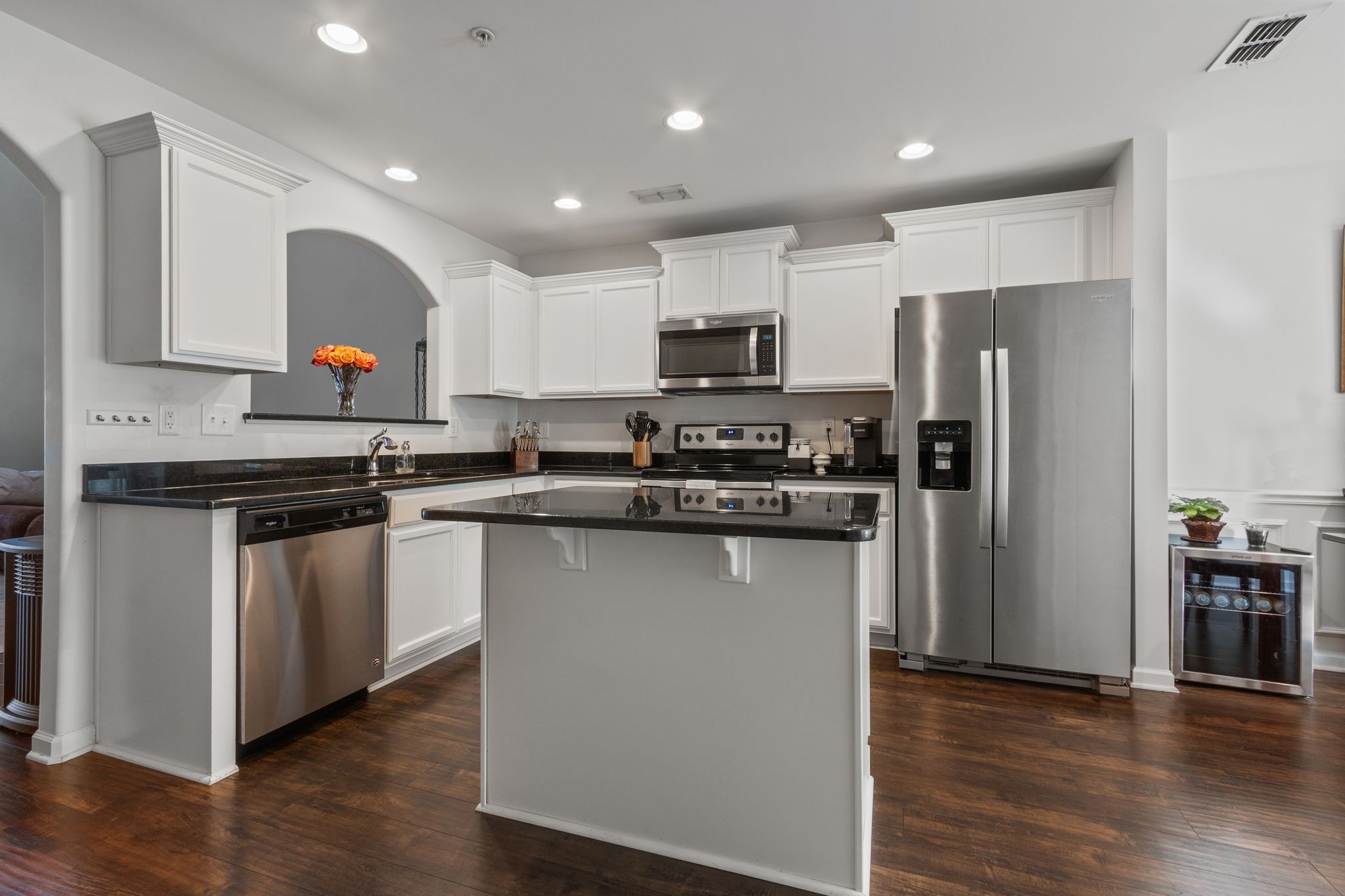 1002 Muna Court Spring Hill, TN 37174 - Photo 6 of 28 a kitchen with stainless steel appliances granite countertop a refrigerator and a stove top oven