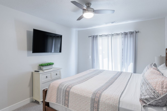 4845 Fishers Is Way St. George, UT 84770 - Photo 9 of 41 Carpeted bedroom with ceiling fan and baseboards