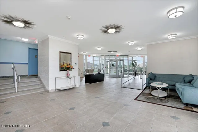 a living room with furniture and a view