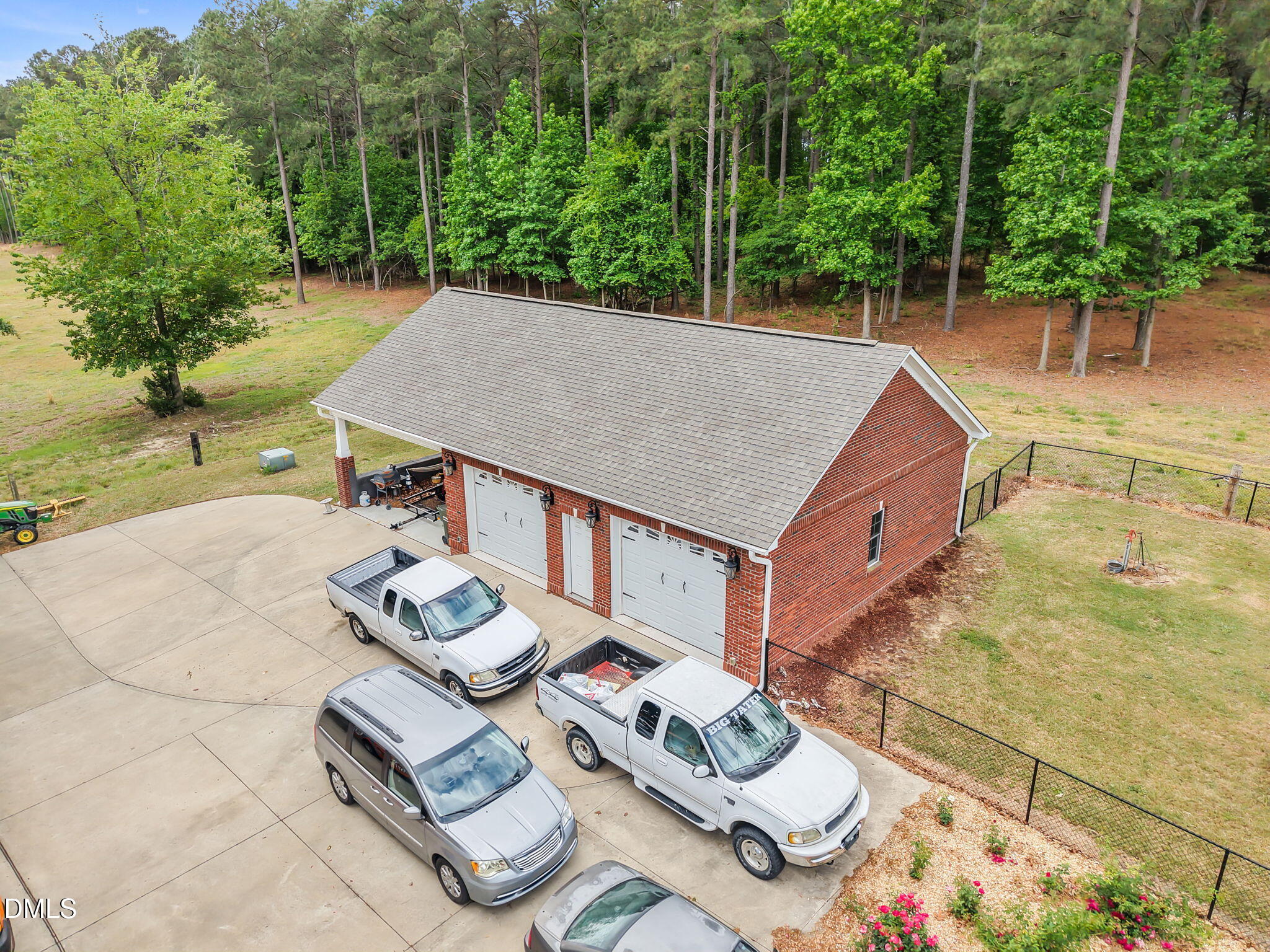 2880 Elevation Road Four Oaks, NC 27524 - Photo 45 of 51 an aerial view of a house with backyard
